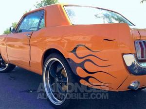 Ford Mustang coupé orange laqué